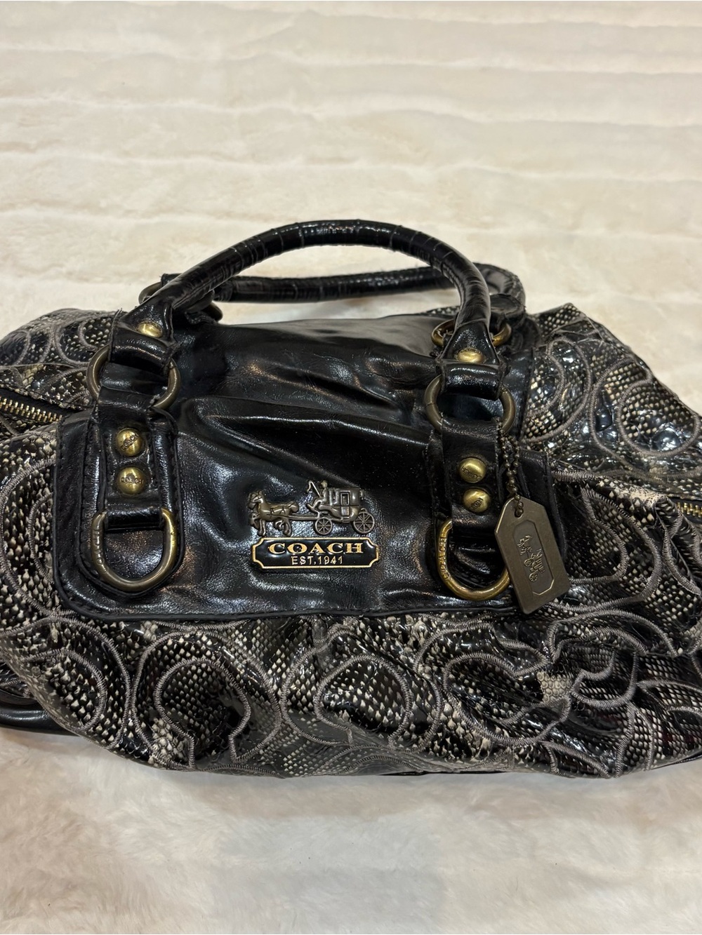 Coach Black and Silver Embossed Signature Satchel